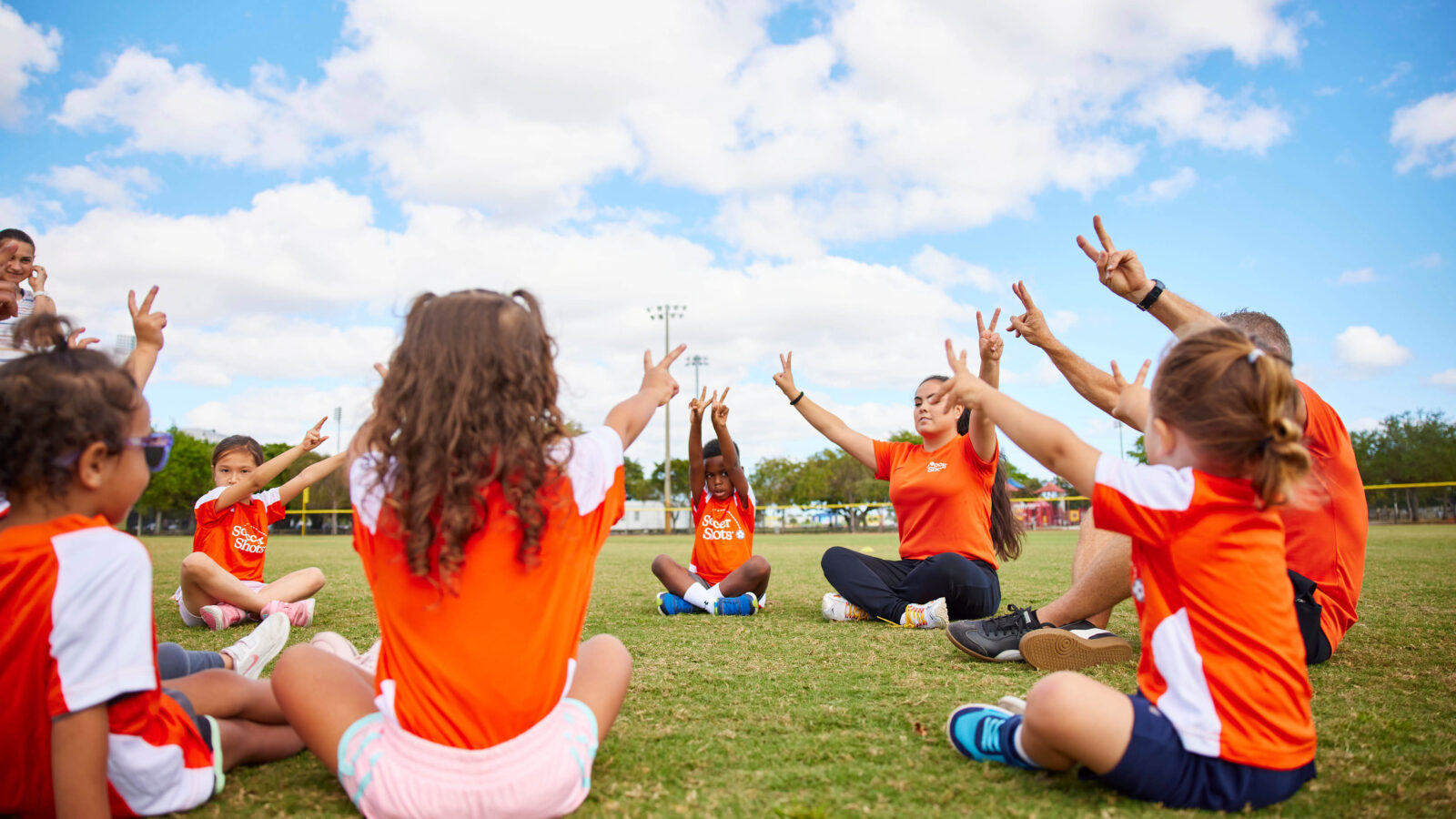Kids gathered in a circle